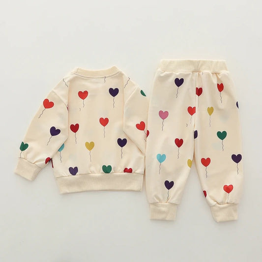 Off White Multi Hearts Printed Sweatshirt with Off White Printed Trouser For Kids